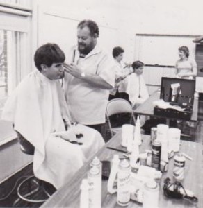 Boys get their hair cut before appearing as extras for the filming of the home game against Dugger, November 19, 1985. The makeshift barbershop was in the vacated school next to the Knightstown gym.
